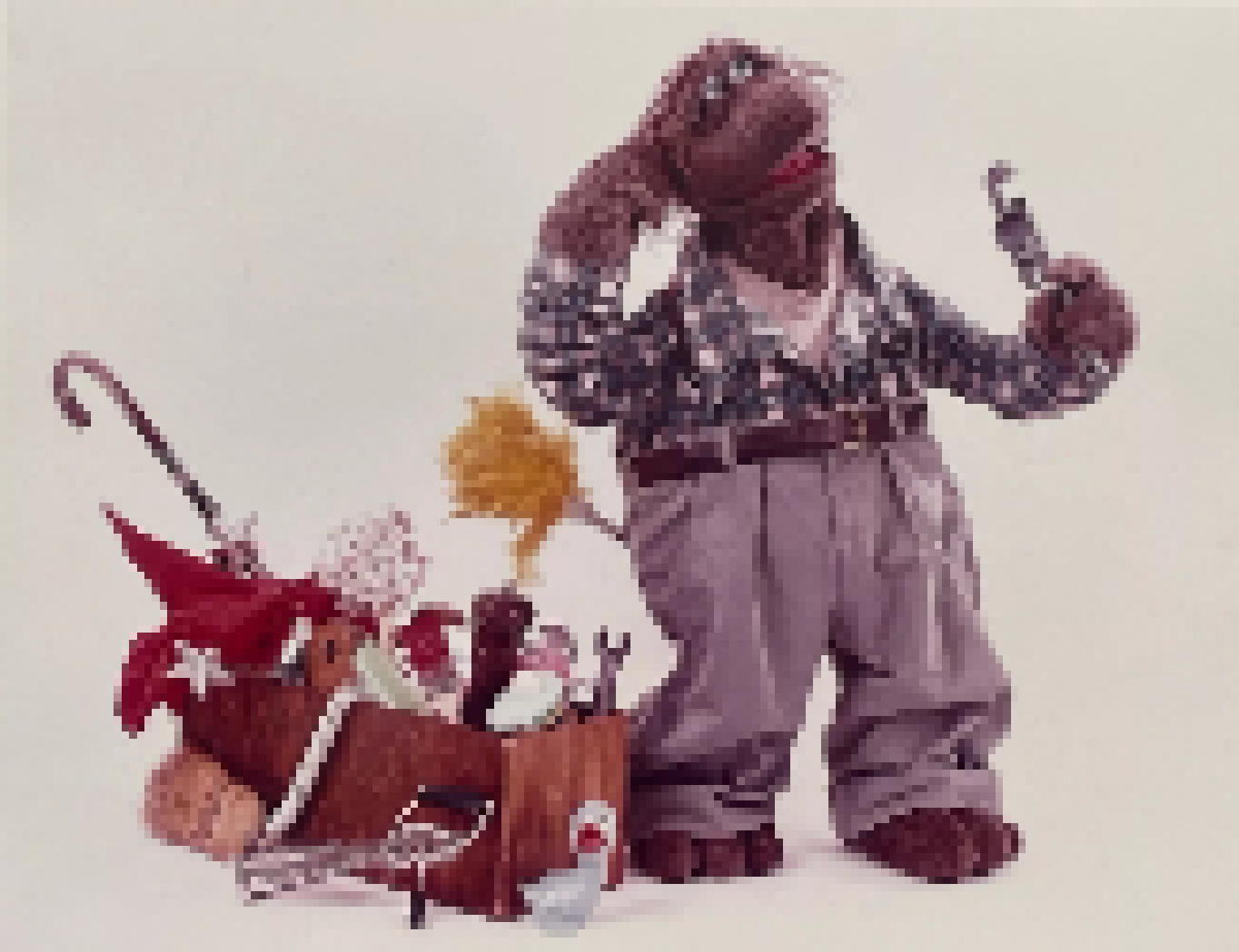 Beauregard the Muppet janitor, looking earnestly confused but content